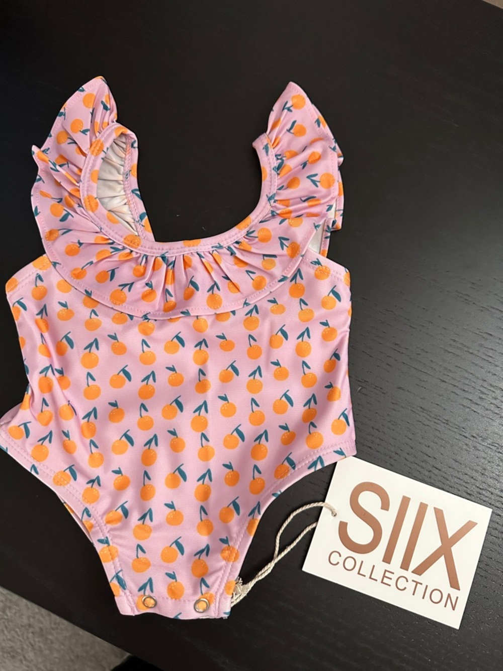 SIIX Collection Peach Print Ruffled Baby One-Piece